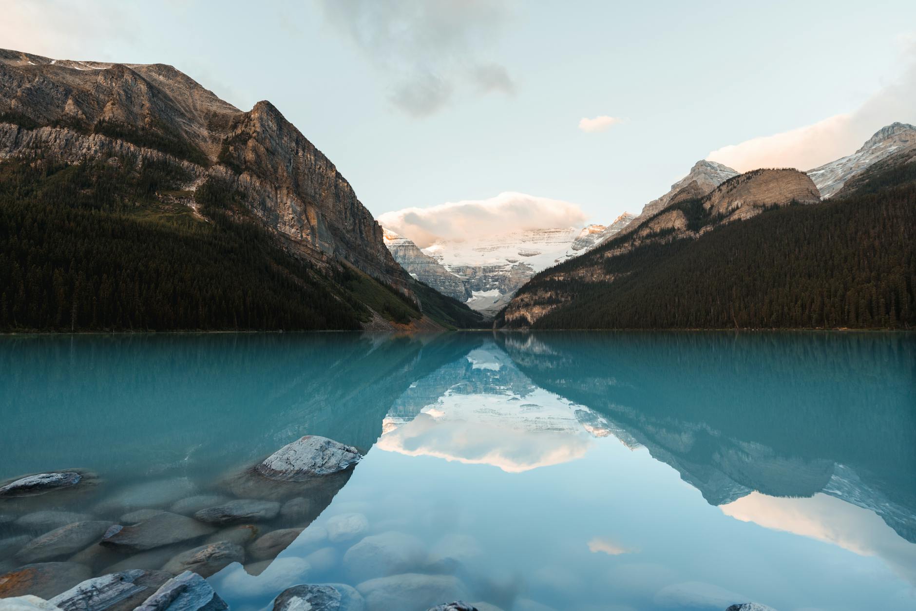 Stunning view of Lake Louise with mountain reflection in Banff National Park, Alberta, Canada.